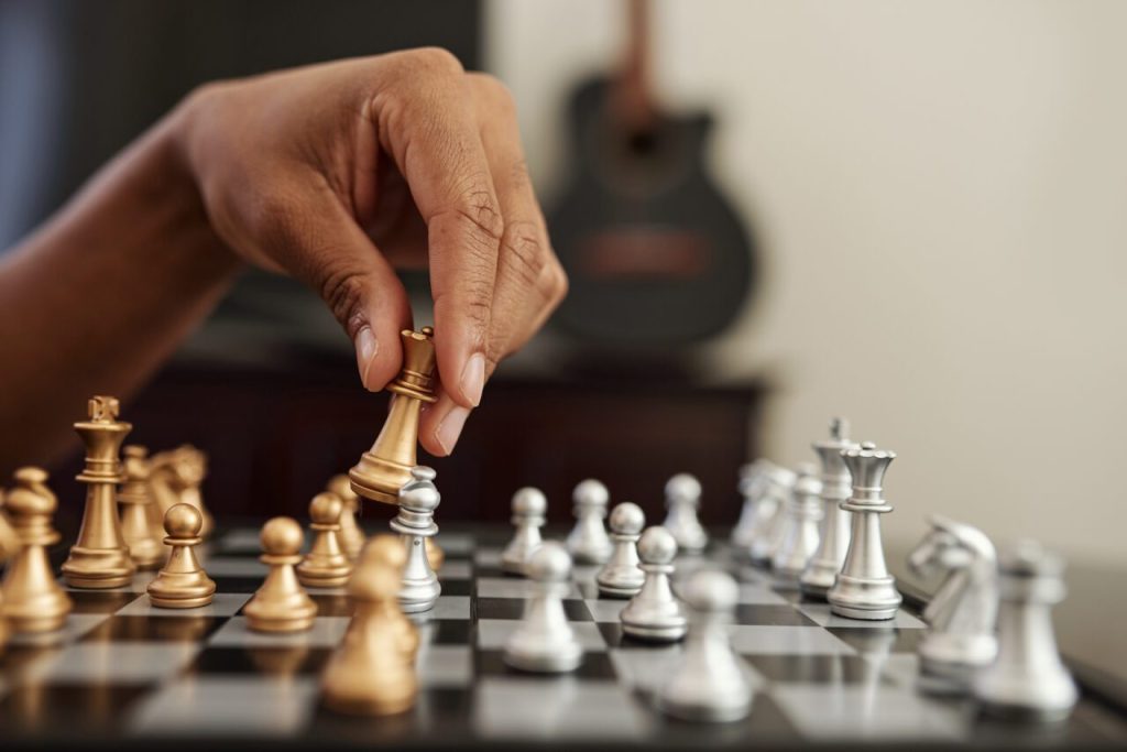 Moving chess piece e1697916134375.jpg